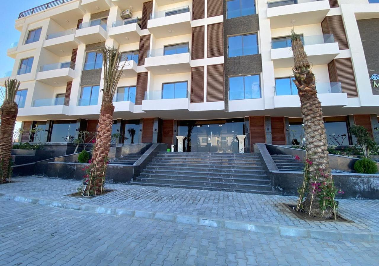 Sanctuary Sunlit Hurghada Haven With 4 Pools, Rooftop Sunsets & Gourmet Bites Steps Away Bagian luar foto
