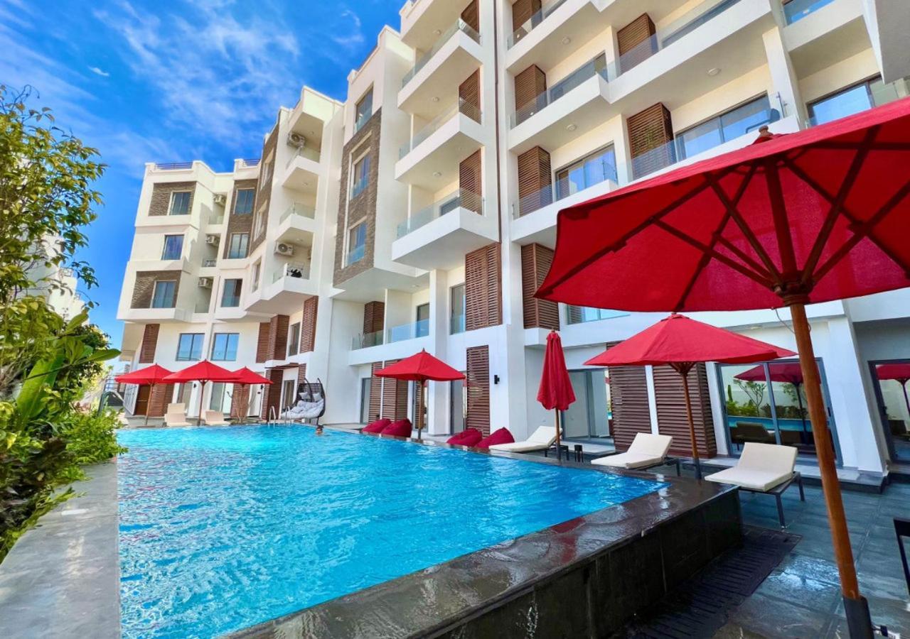 Sanctuary Sunlit Hurghada Haven With 4 Pools, Rooftop Sunsets & Gourmet Bites Steps Away Bagian luar foto