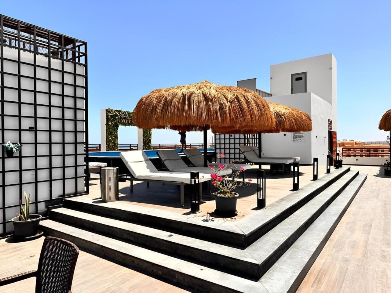 Sanctuary Sunlit Hurghada Haven With 4 Pools, Rooftop Sunsets & Gourmet Bites Steps Away Bagian luar foto